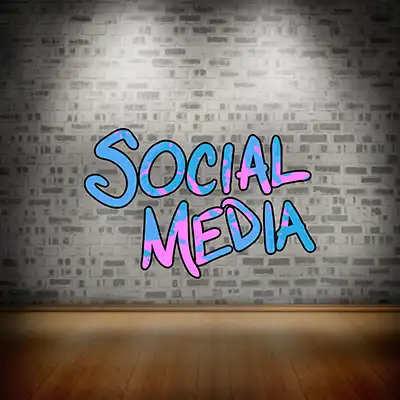 Ayo Ola Fundraising Consultant Decorative image of Social Media" text in blue and pink graffiti style on a brick wall with a wooden floor in front.